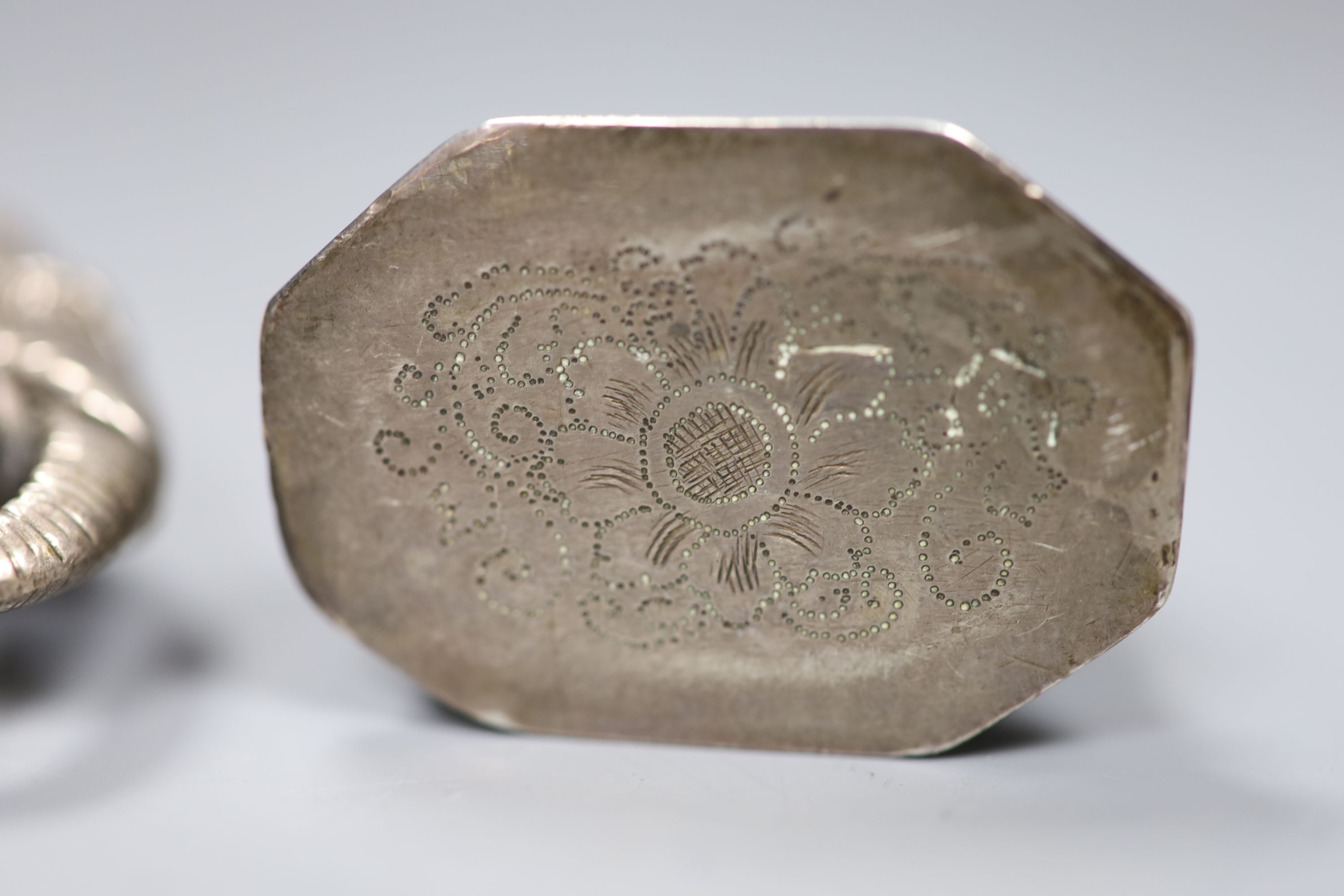 A group of Chinese bronze seals and a white metal elephant